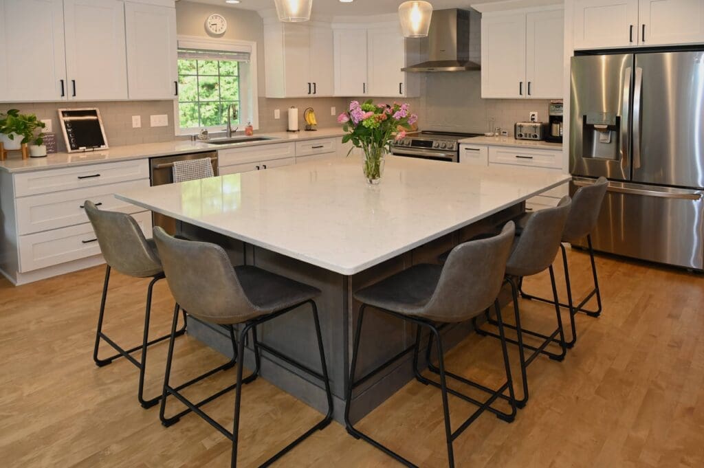 Home addition for a kitchen expansion with larger island, and first-floor remodel in Hartland, Wisconsin.
